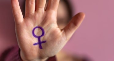 International Women's Day. Feminist movement concept. Feminism. 8 March. High quality photo. Independent young woman, feminism concept.