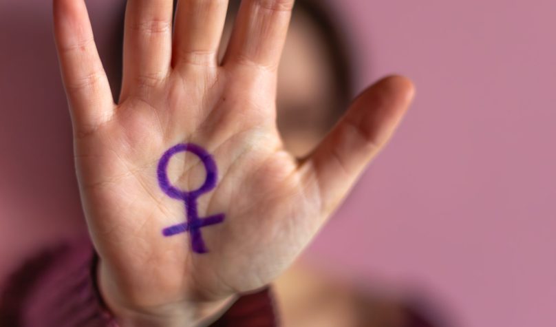 International Women's Day. Feminist movement concept. Feminism. 8 March. High quality photo. Independent young woman, feminism concept.